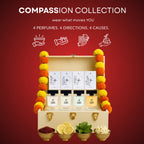 Perfume set with decorative elements on a red background, featuring the 'Compassion Collection' branding.